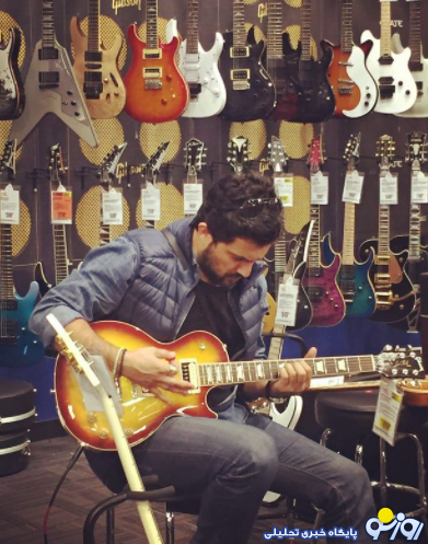 حامد بهداد در حال نواختن گیتار + عکس