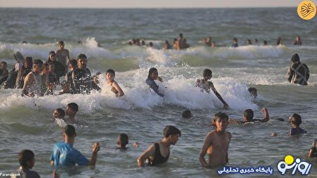آبتنی فلسطینی‌ها در ساحل غزه/عکس