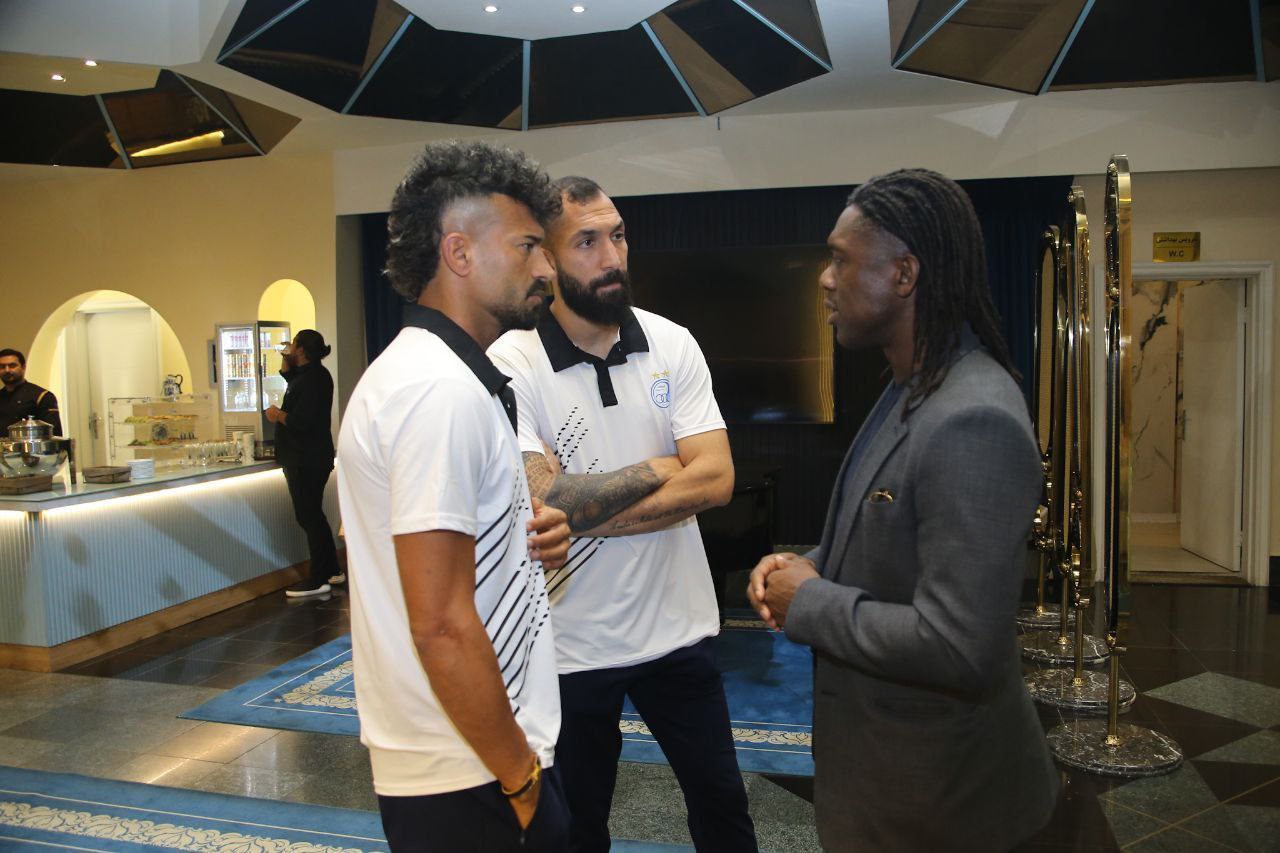 عکس از روزبه چشمی و رامین رضاییان و کلارنس سیدورف در فرودگاه