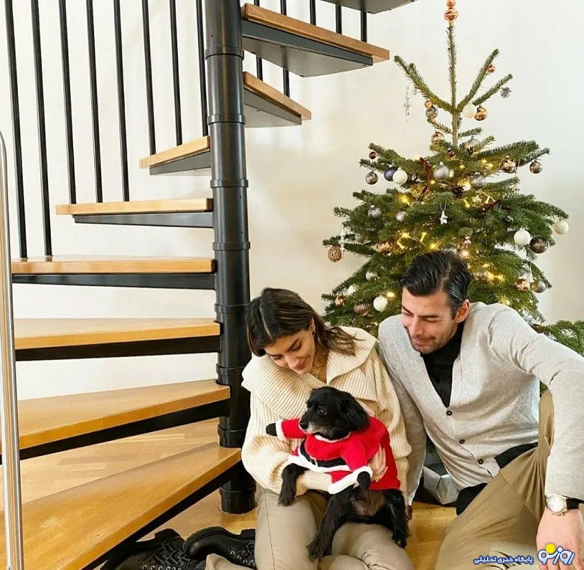 عکس جدید فریدون زندی فوتبالیست دو رگه با همسر ، سگ و درخت کریسمس