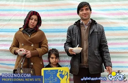 توزیع آش در حاشیه راهپیمایی 9دی/عکس